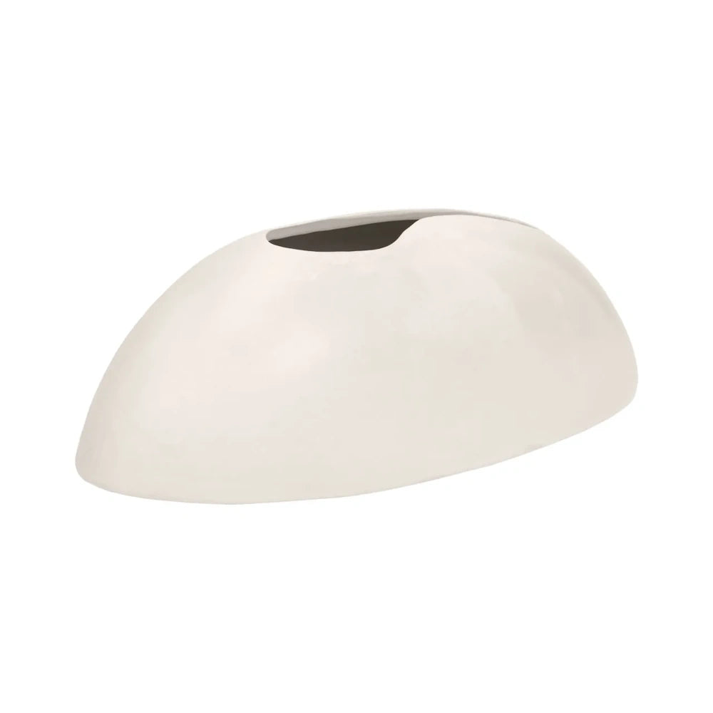 Side angle of an asymmetrical, low-profile white ceramic vase with an elongated, organic dome shape.