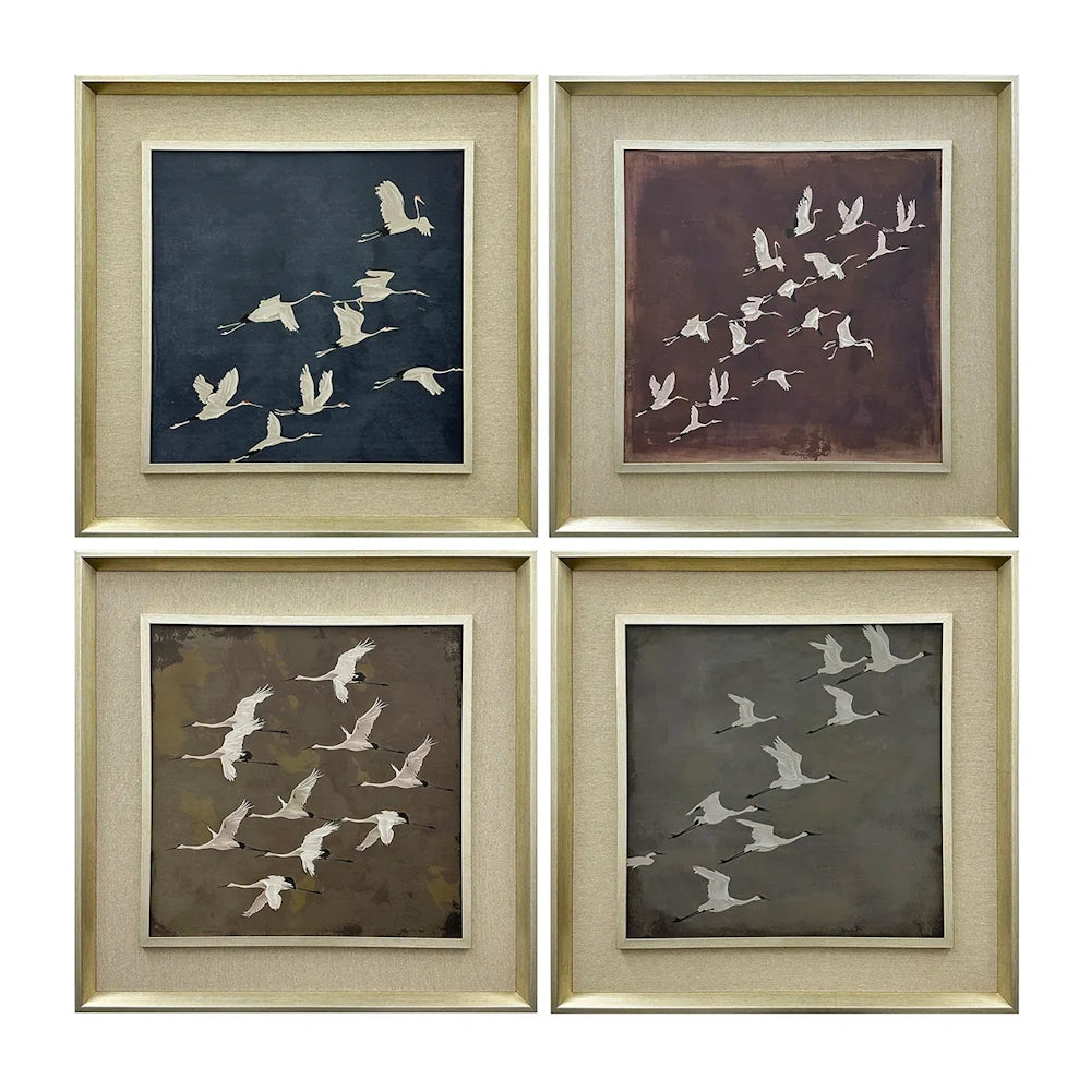 Set of 4 framed wall art prints depicting white cranes in flight against muted, dark-toned backgrounds.
