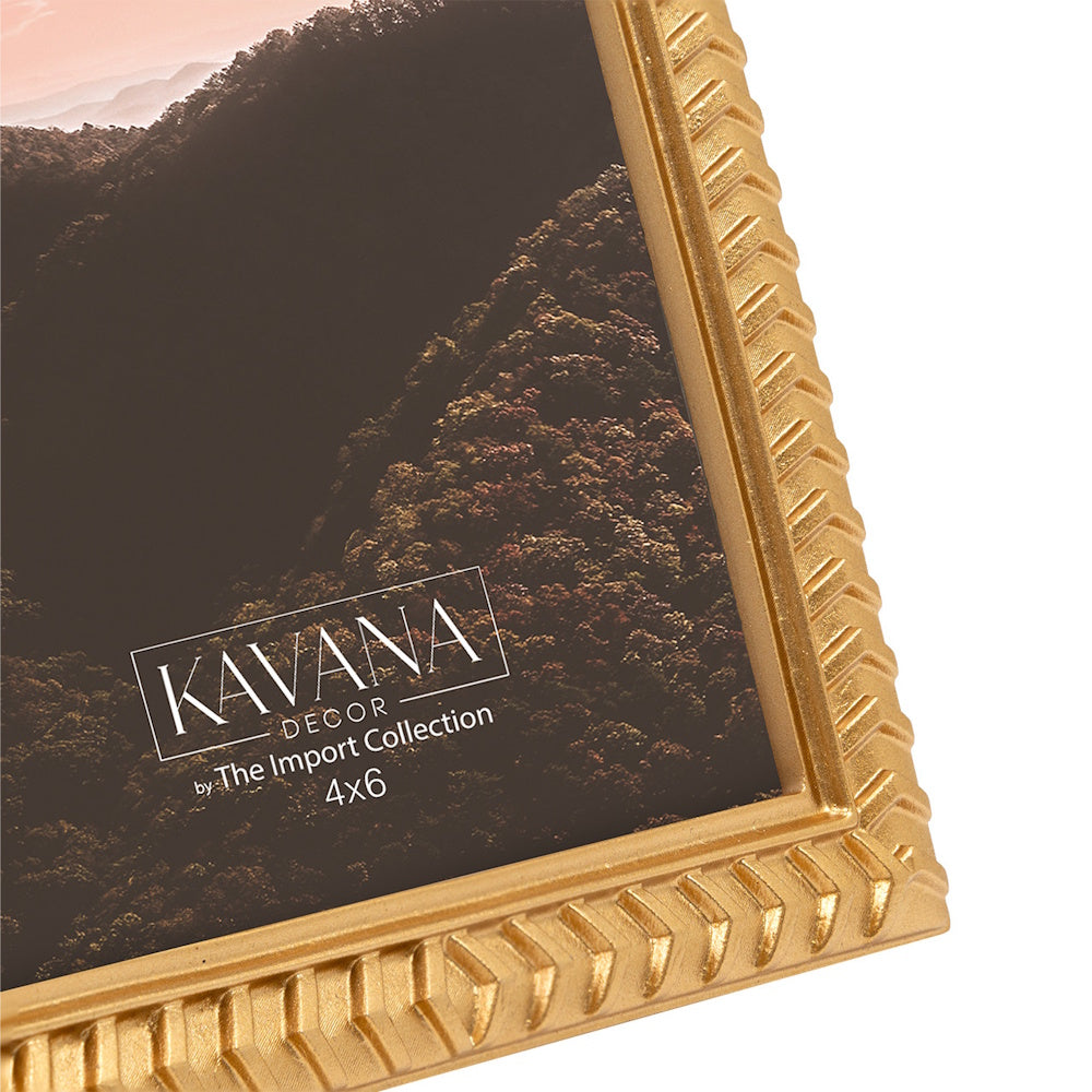 Close-up of a 4x6 Kavana Decor gold picture frame with a textured chevron pattern and a nature-themed insert.