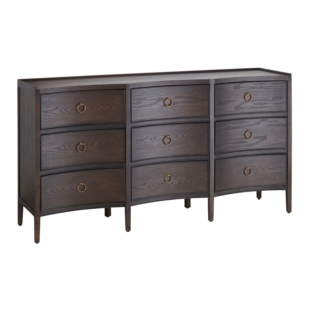 Curved dark wood 9-drawer dresser with brass ring pulls on a white background for bedroom furniture.
