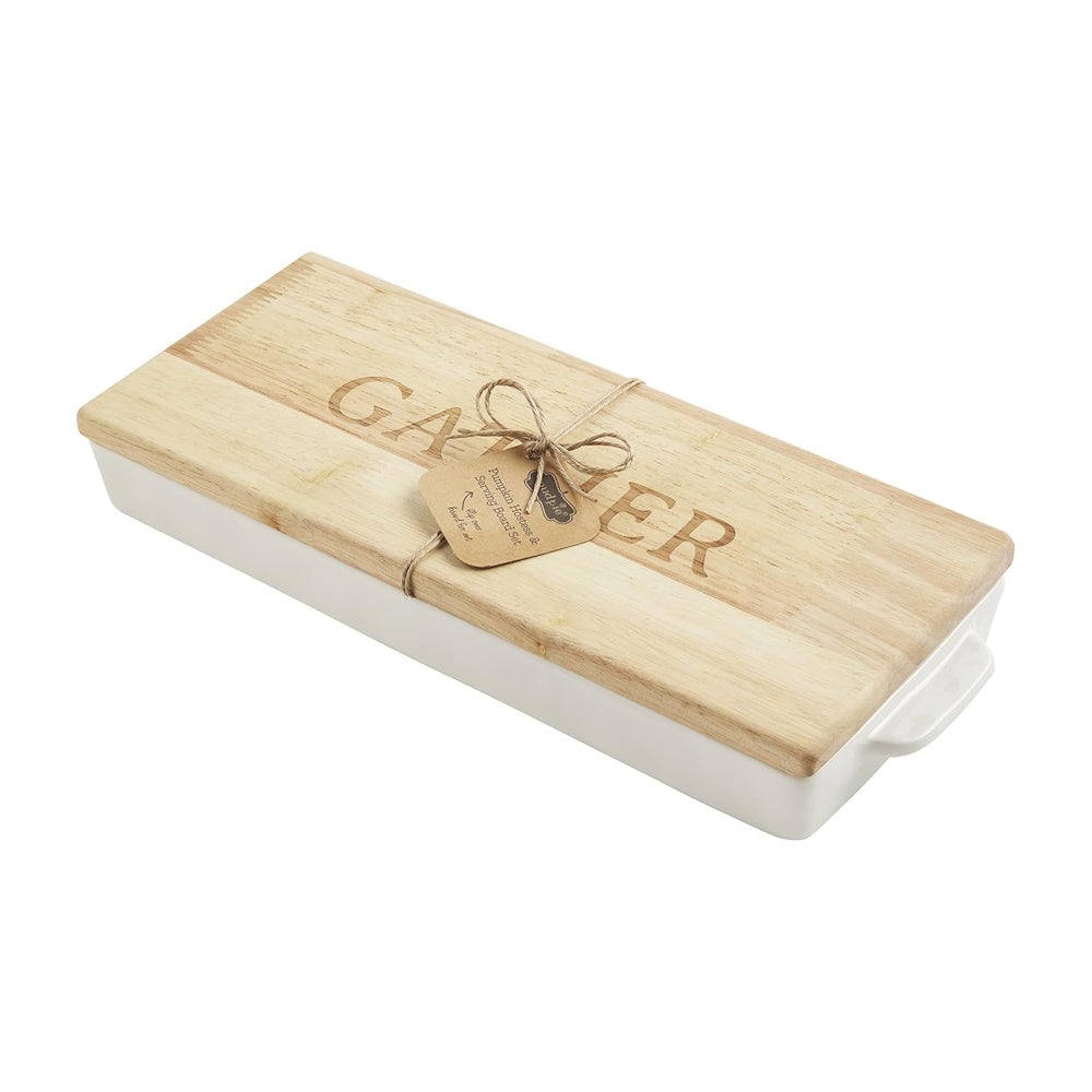 White ceramic rectangular baking dish with a wooden lid engraved with the word "GATHER".