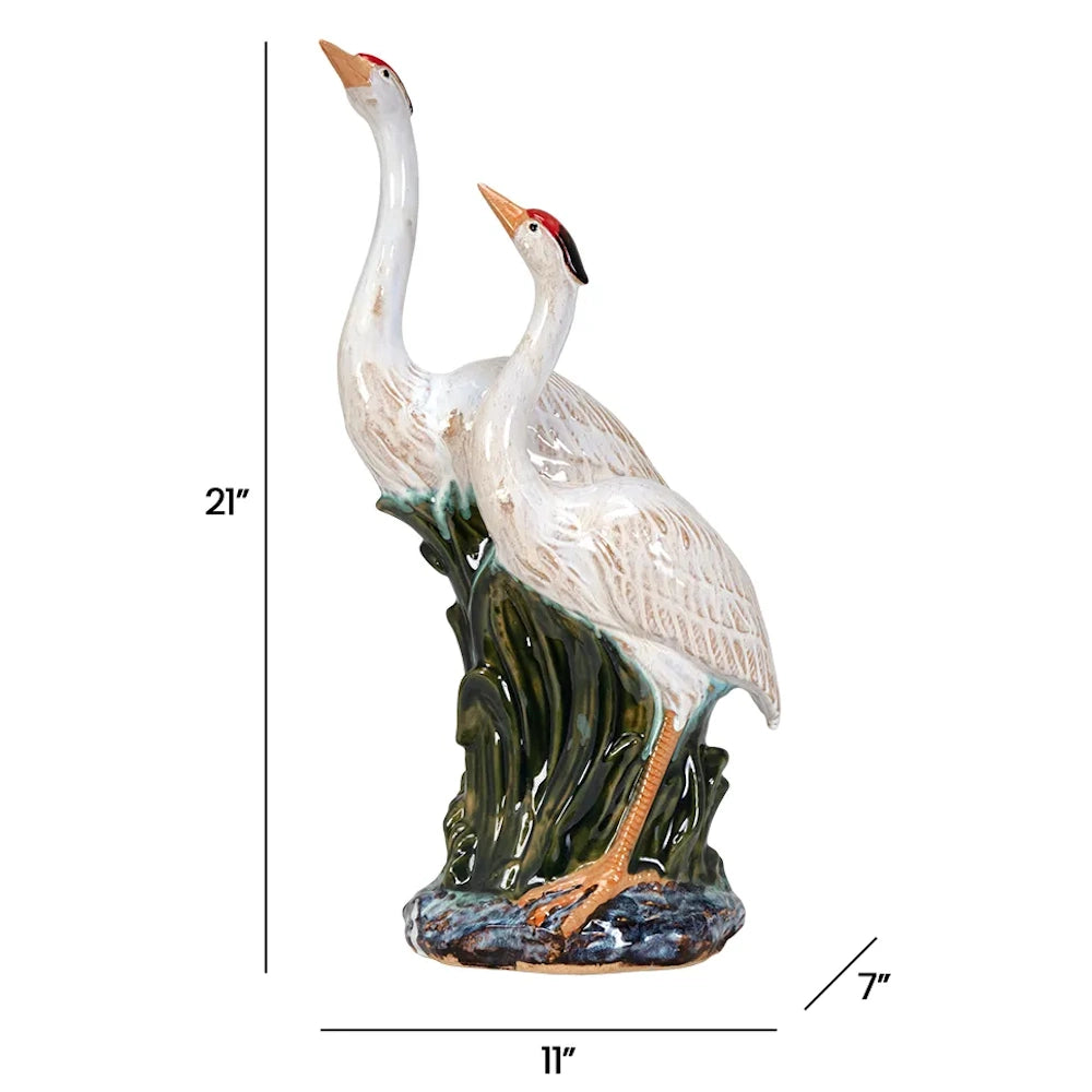Two herons figurine with dimension labels: 21 inches high, 11 inches wide, and 7 inches deep.