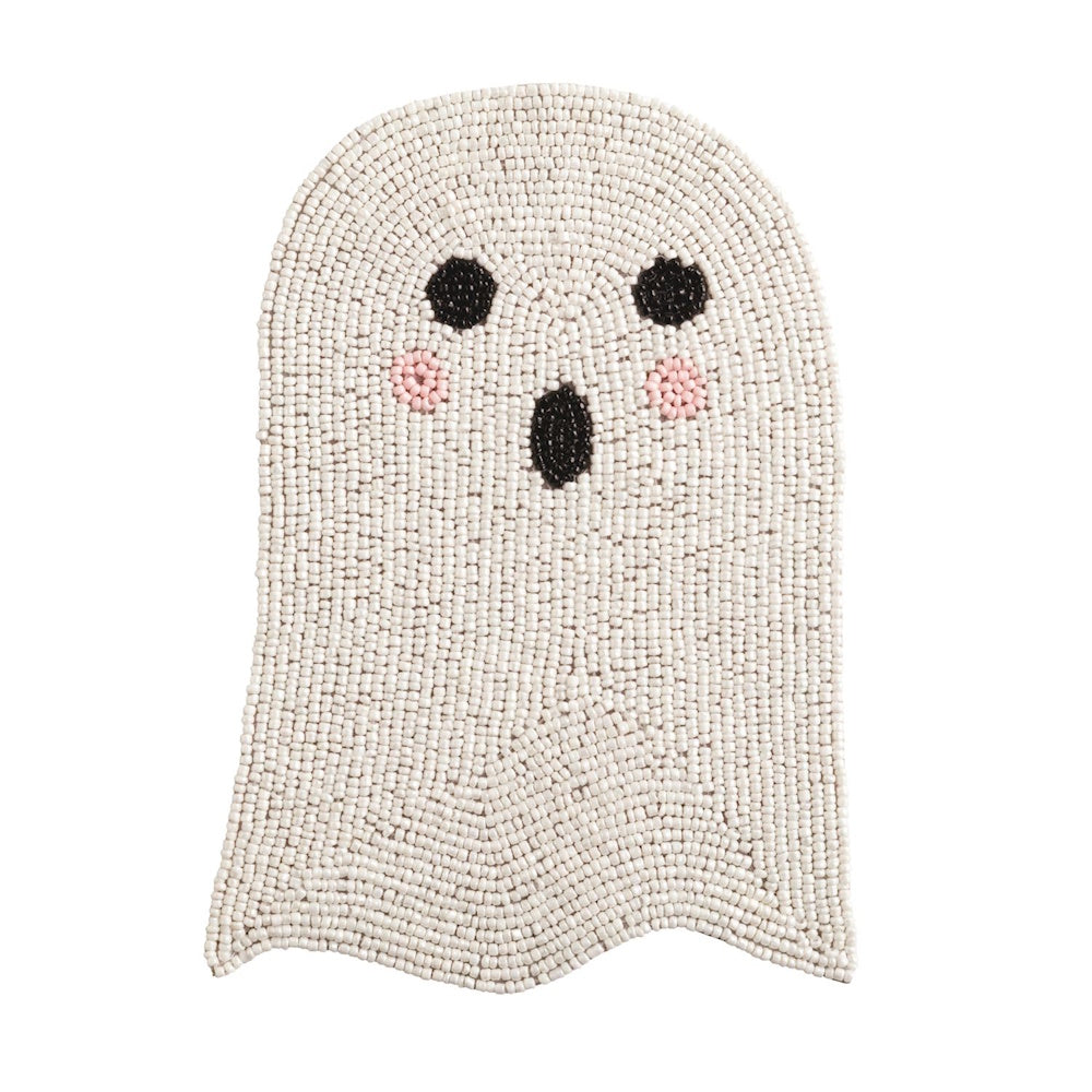 White beaded ghost-shaped trivet with black eyes, a mouth, and pink cheeks.