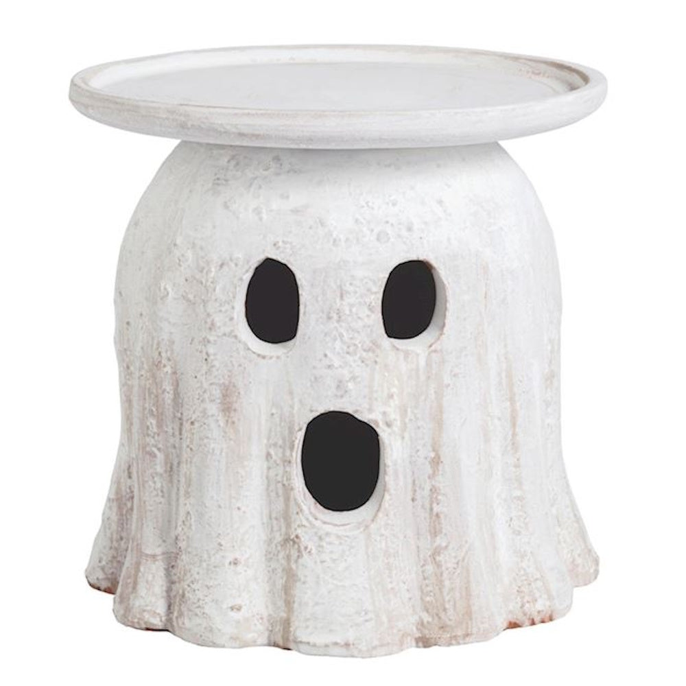 White ceramic ghost pillar candle holder Halloween decoration.