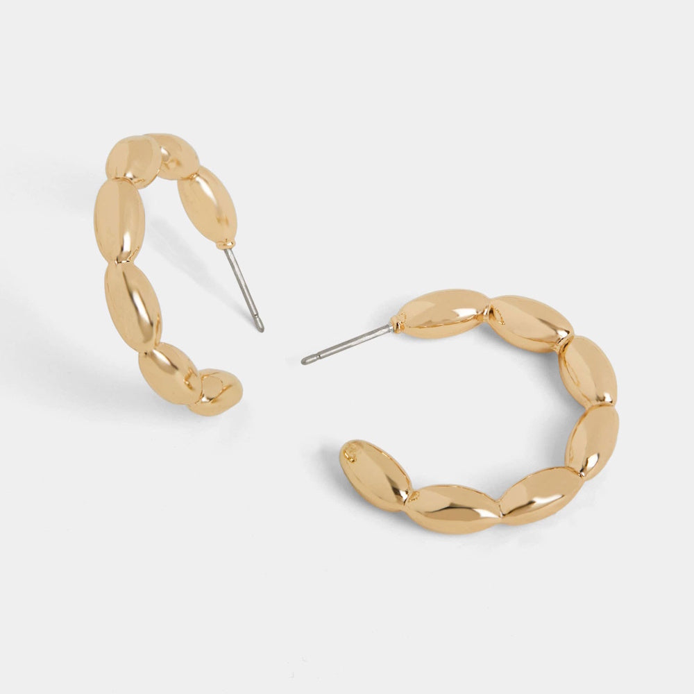 Chunky gold bubble hoop earrings with beaded oval textures and post backings on a white background.