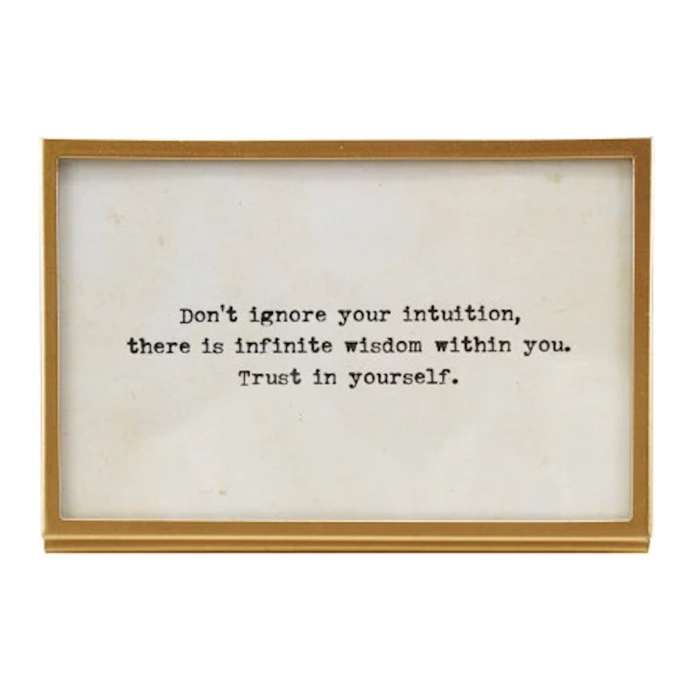 Gold-finish metal and glass picture frame featuring an inspirational typewriter-style quote about trusting your intuition.