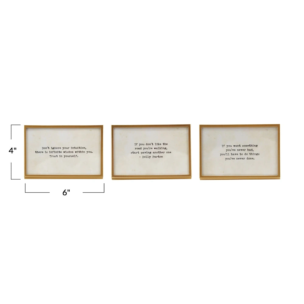 Set of three 4x6 gold metal and glass frames with inspirational quotes by Dolly Parton and others on easels.