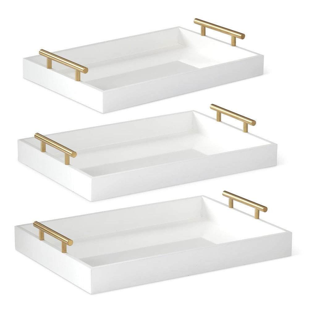 Three rectangular white decorative trays with modern brushed gold metal handles, stacked diagonally on a white background.