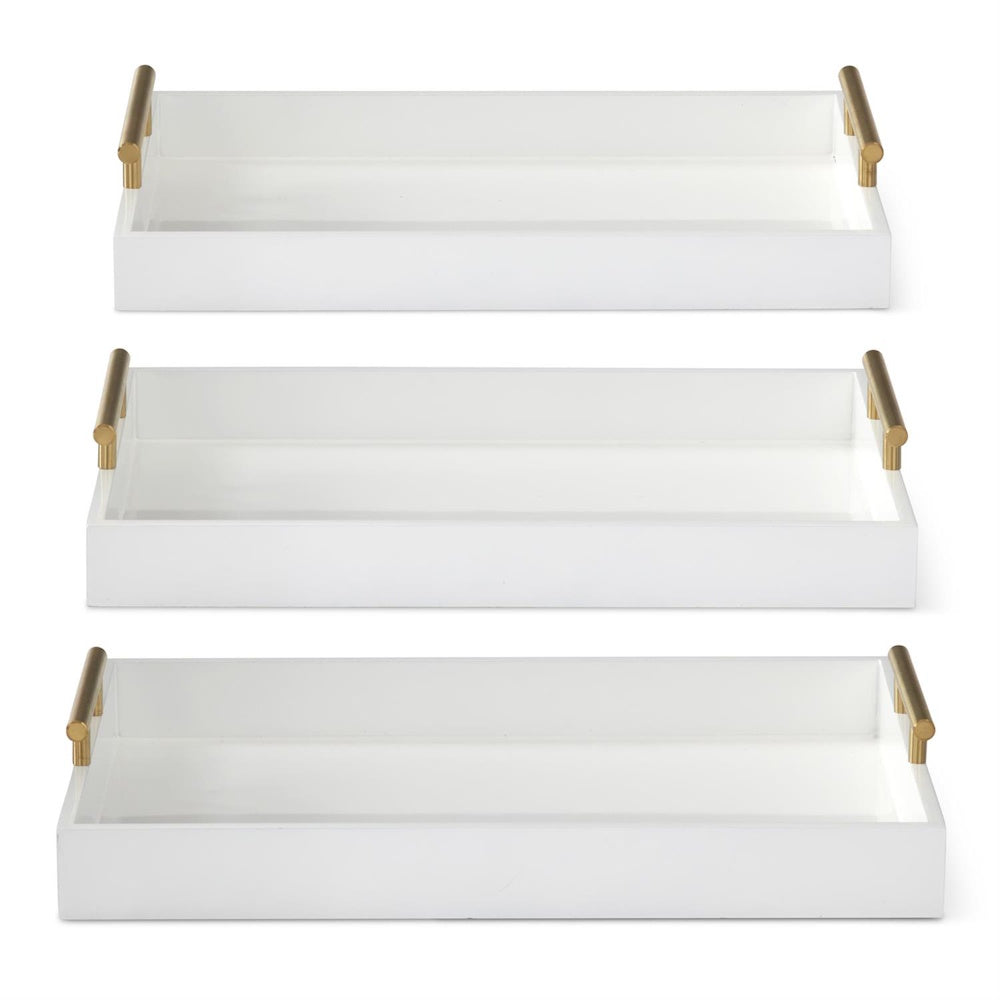 Three rectangular white decorative trays with brushed gold cylindrical handles, stacked vertically on a white background.