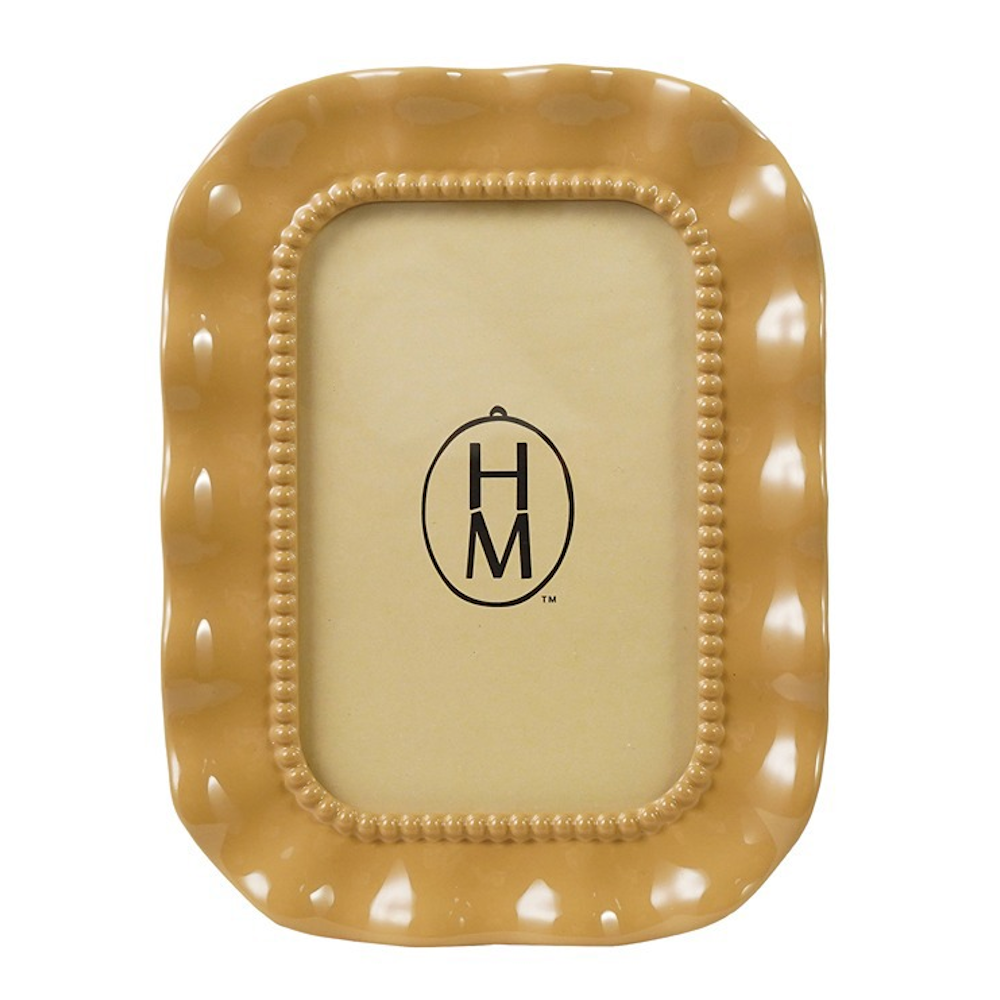 Glossy golden-yellow resin photo frame featuring a scalloped wavy outer edge and beaded inner border.