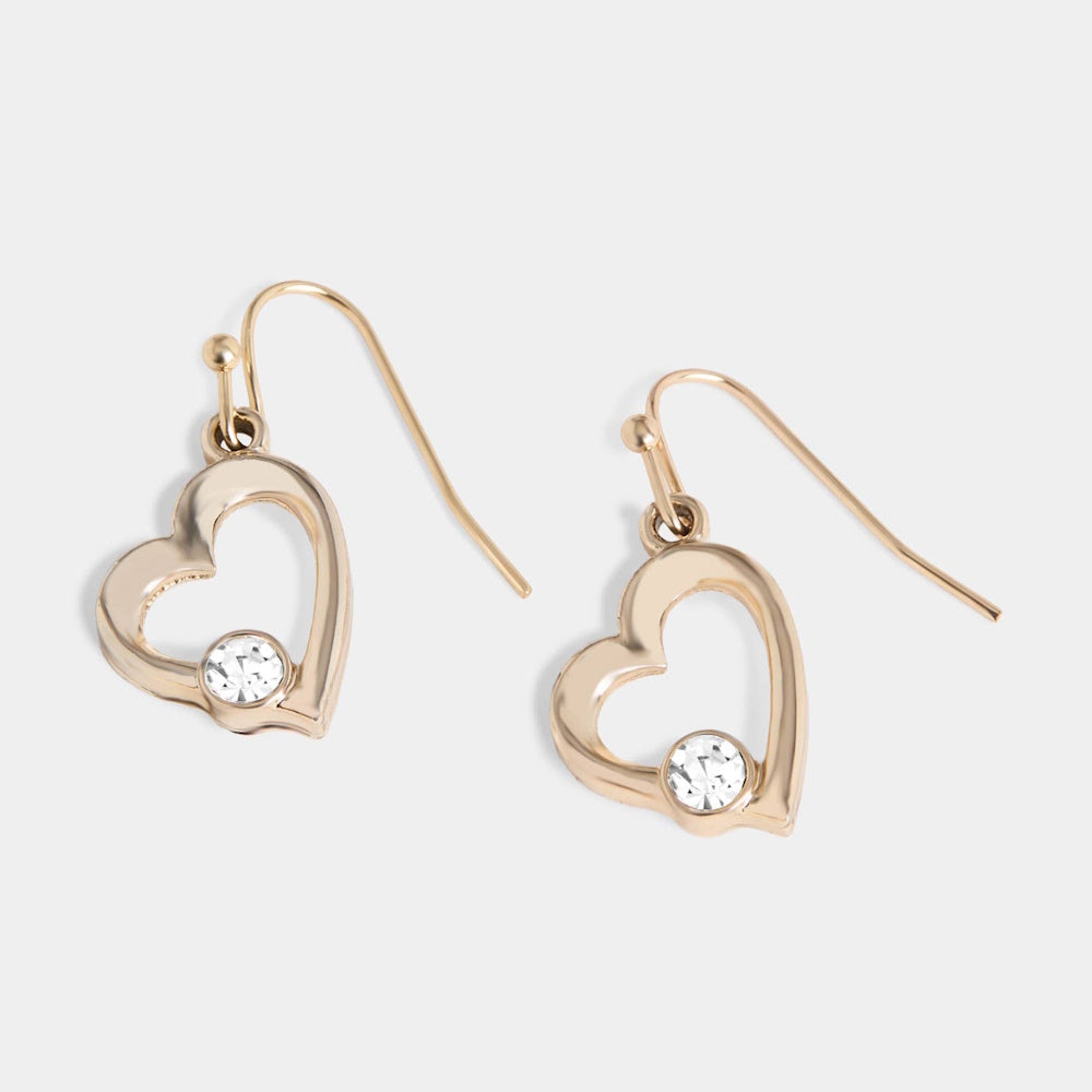 A pair of gold open-heart dangle earrings with a small crystal accent, shown on a white background.