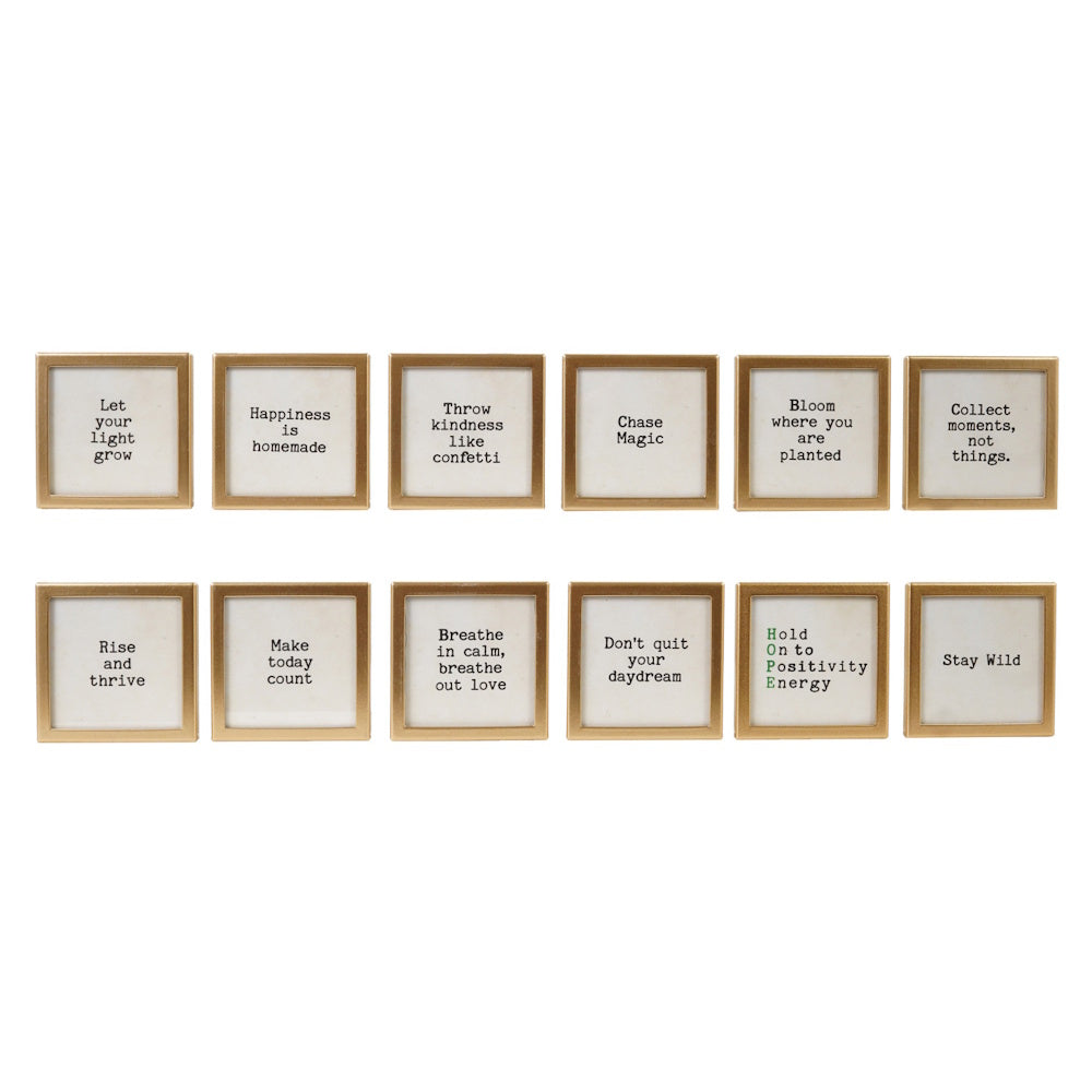 Collection of 12 square gold-framed magnets with various motivational sayings.