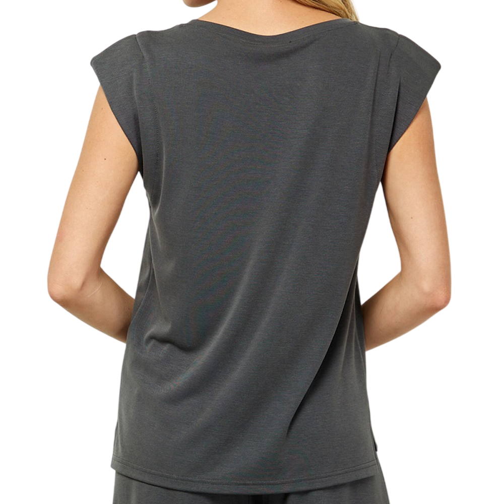 Back view of a person wearing a dark gray sleeveless top with padded cap shoulders.