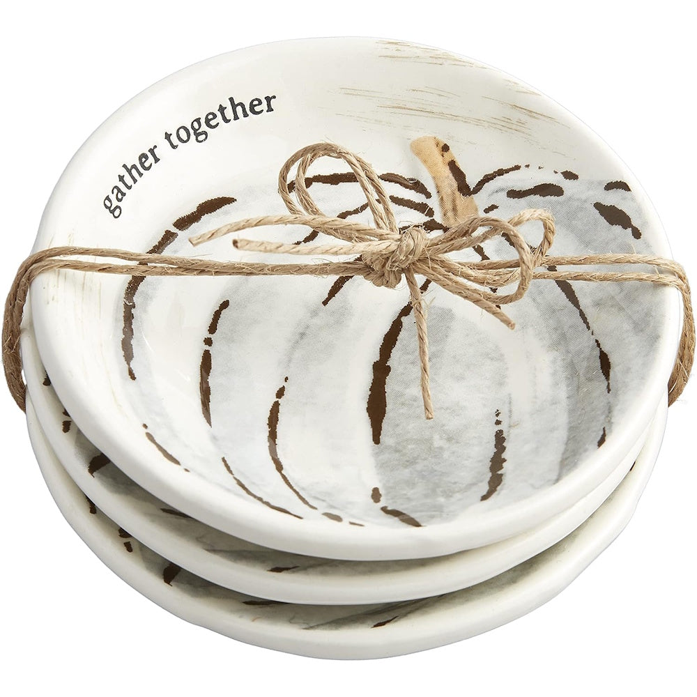 Stacked white dipping dishes with a pumpkin design, text "gather together," and tied with a twine bow.