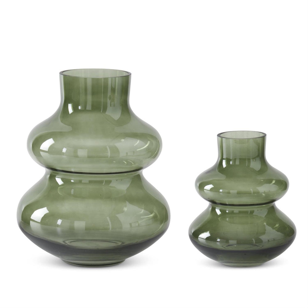 Two tiered green tinted glass vases in small and large sizes on a white background.