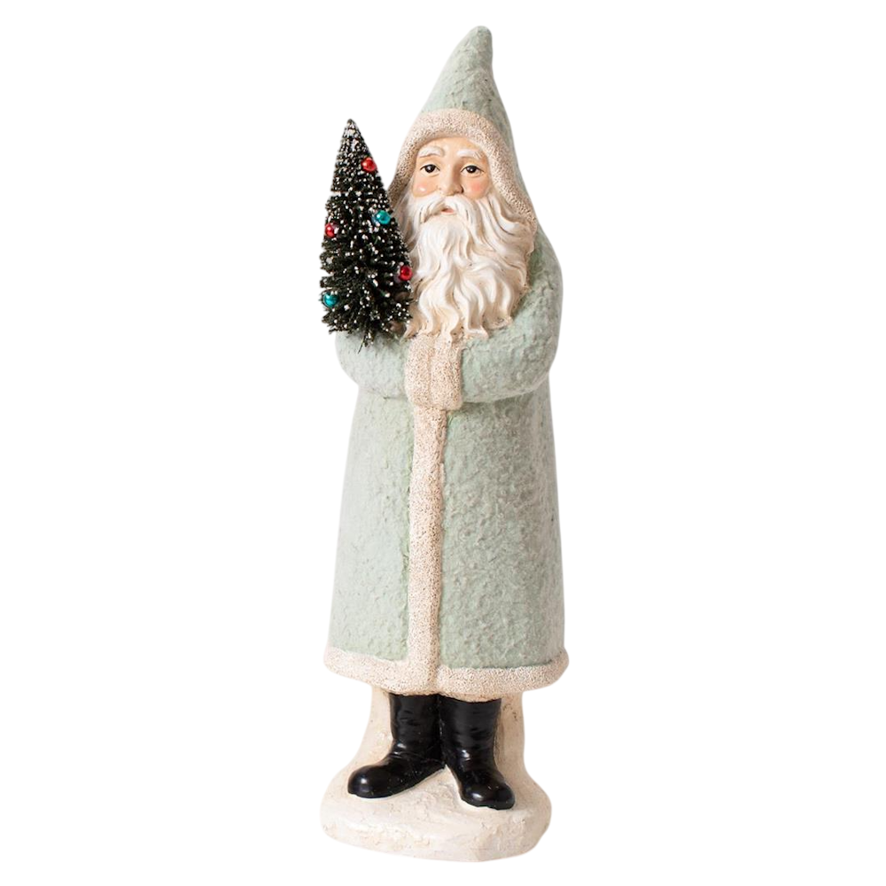 Pastel light green Belsnickel Santa figurine holding a decorated miniature Christmas tree.
