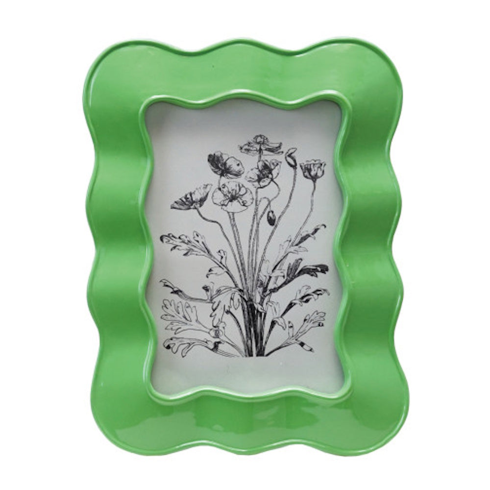 Bright green wavy resin photo frame featuring a black and white vintage floral sketch.