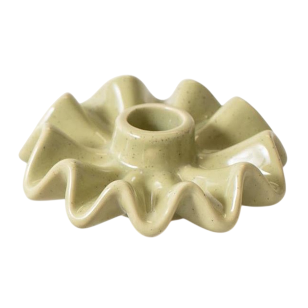 Speckled sage green ceramic taper candle holder with a ruffled, wavy-edge base.