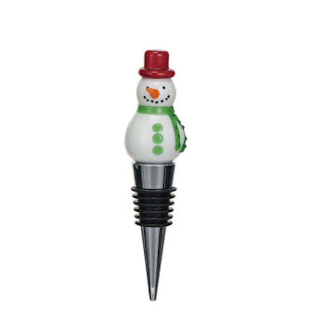 Snowman bottle stopper wearing a red hat and green scarf, featuring a ribbed metal and rubber base.