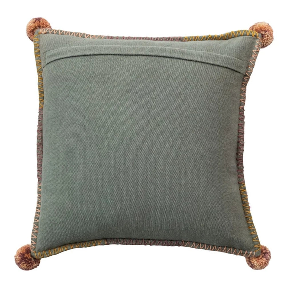 Sage green bohemian pillow cover back details, cotton canvas fabric with decorative stitching and pom-pom accents.