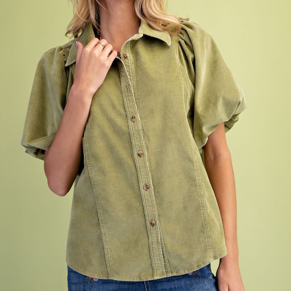 Front view close-up of green-tea washed baby corduroy button-down blouse with puffed sleeves.