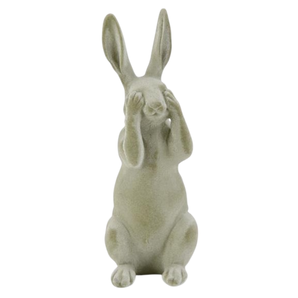 Green velvet bunny figurine in a "see no evil" pose covering its eyes.
