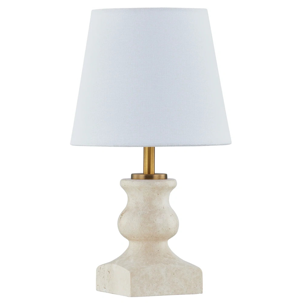 Modern stone table lamp with a white fabric shade and gold brass neck on a white background.
