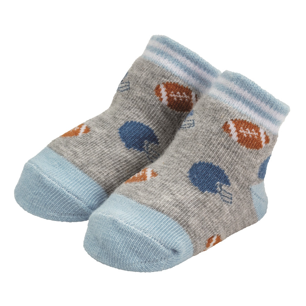 Pair of grey baby socks with light blue accents featuring a pattern of brown footballs and blue helmets.