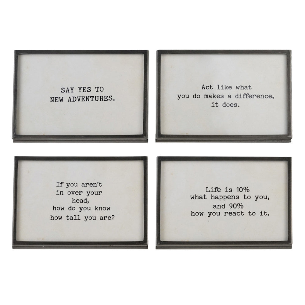 Four gunmetal finish metal and glass frames with easel backs displaying different inspirational quotes.