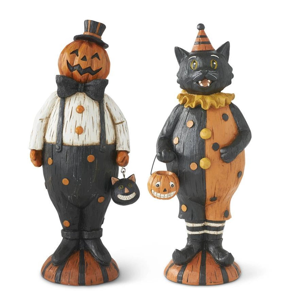 Vintage style Halloween figurines of a pumpkin man in a top hat and a black cat dressed as a clown.