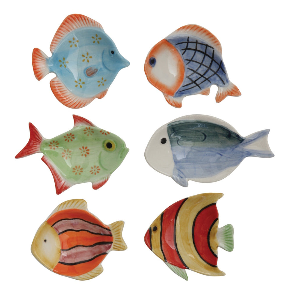 Six small, hand-painted ceramic dishes shaped like colorful tropical fish, arranged in a two-by-three grid.
