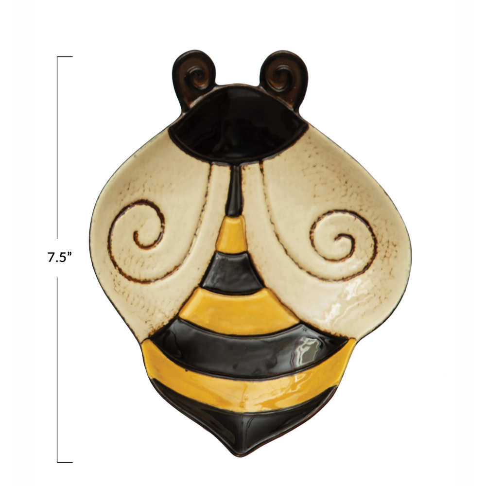 Bee-shaped ceramic plate with yellow and black stripes, showing a 7.5-inch vertical measurement line.