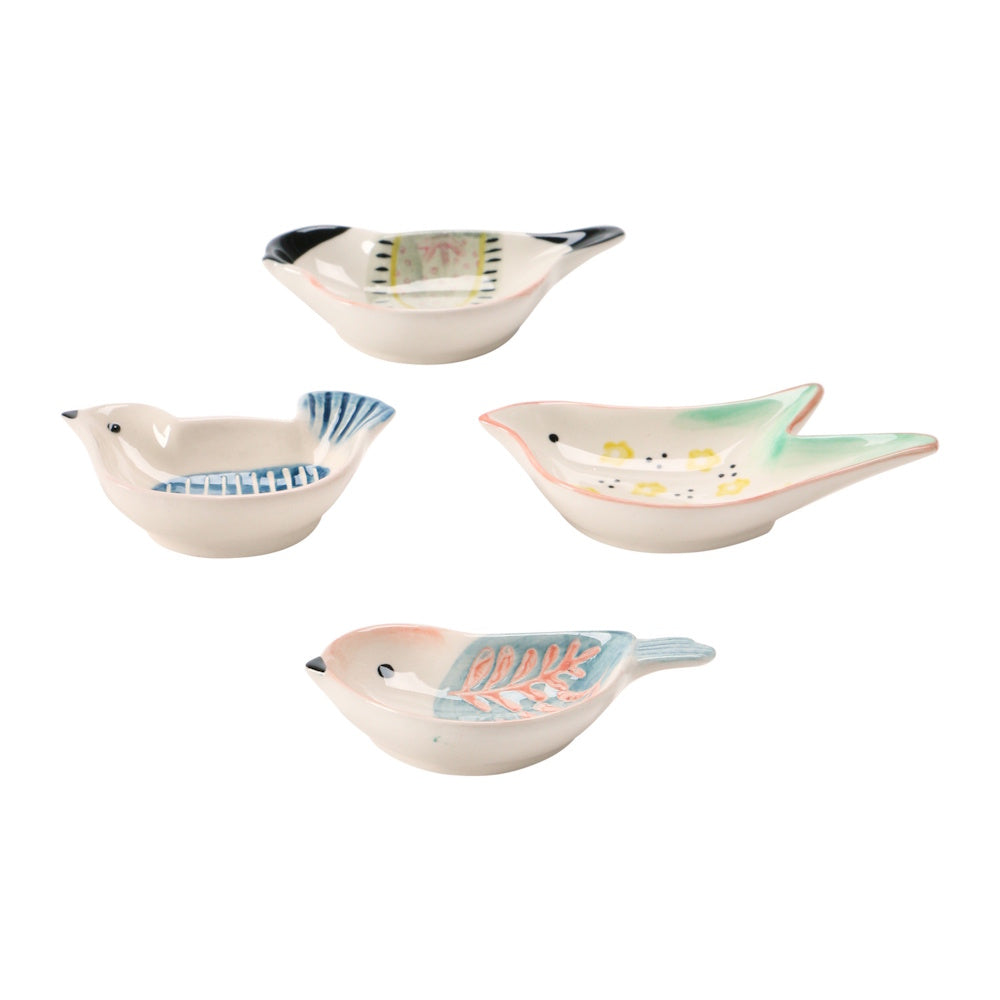 A set of four small, hand-painted ceramic bird-shaped dishes, each with unique colorful details.