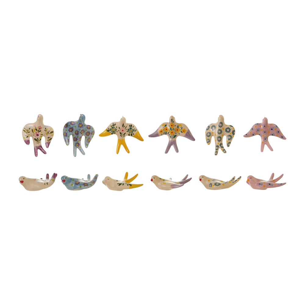 Six different hand-painted stoneware birds shown from both top and profile views in two horizontal rows.