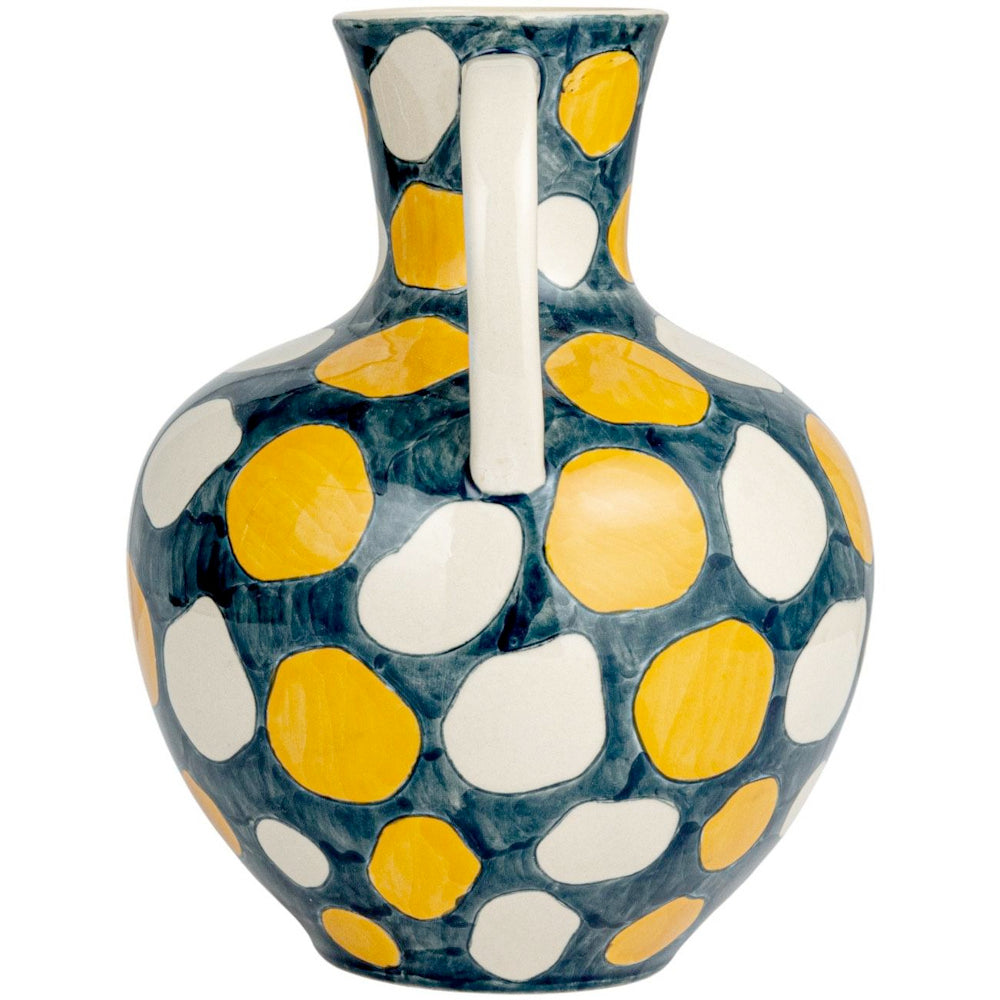 Decorative yellow and white spotted ceramic pitcher with handle, artisan handcrafted vase for home decor.