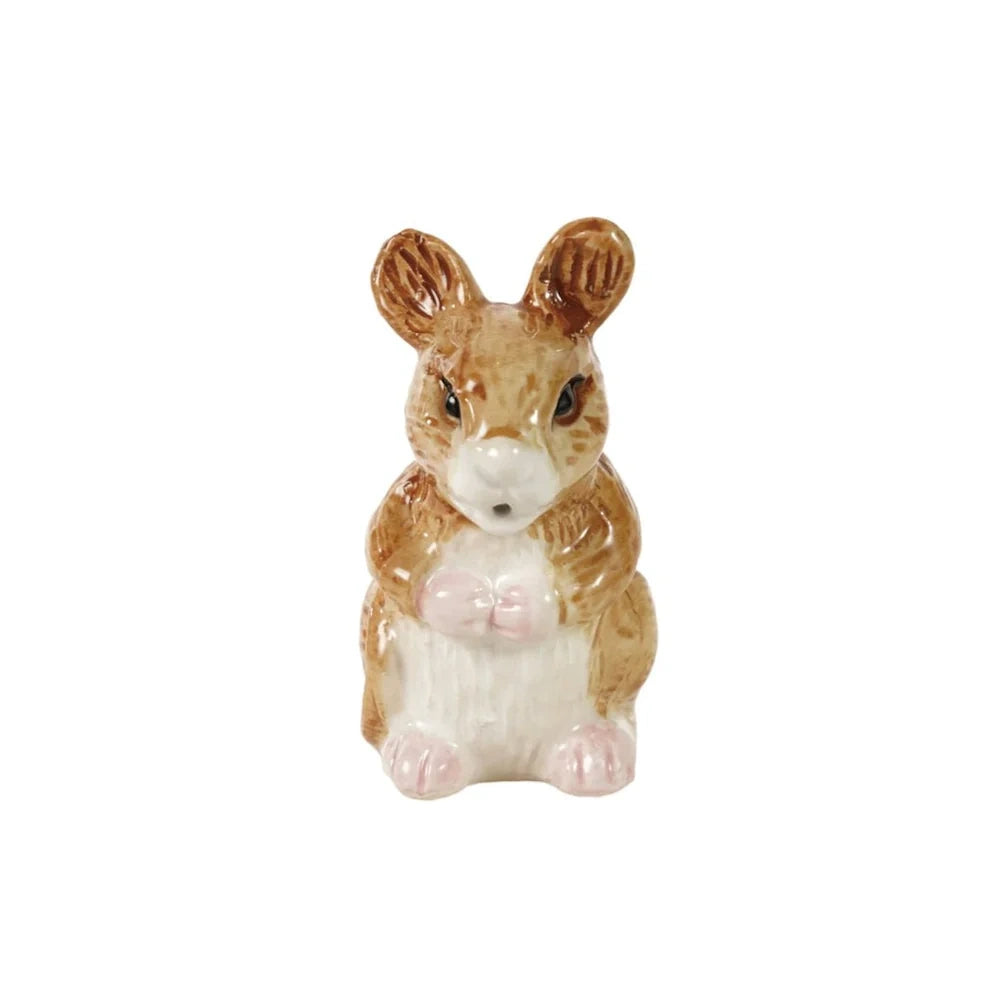 Front view of the hand-painted brown stoneware mouse-shaped creamer, showing its white belly and paws.