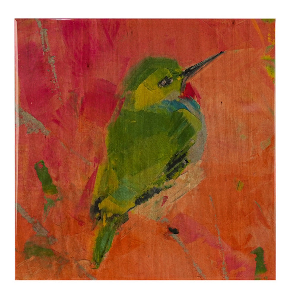 A hand-painted green bird with a long beak on a textured, vibrant orange and pink wooden background.