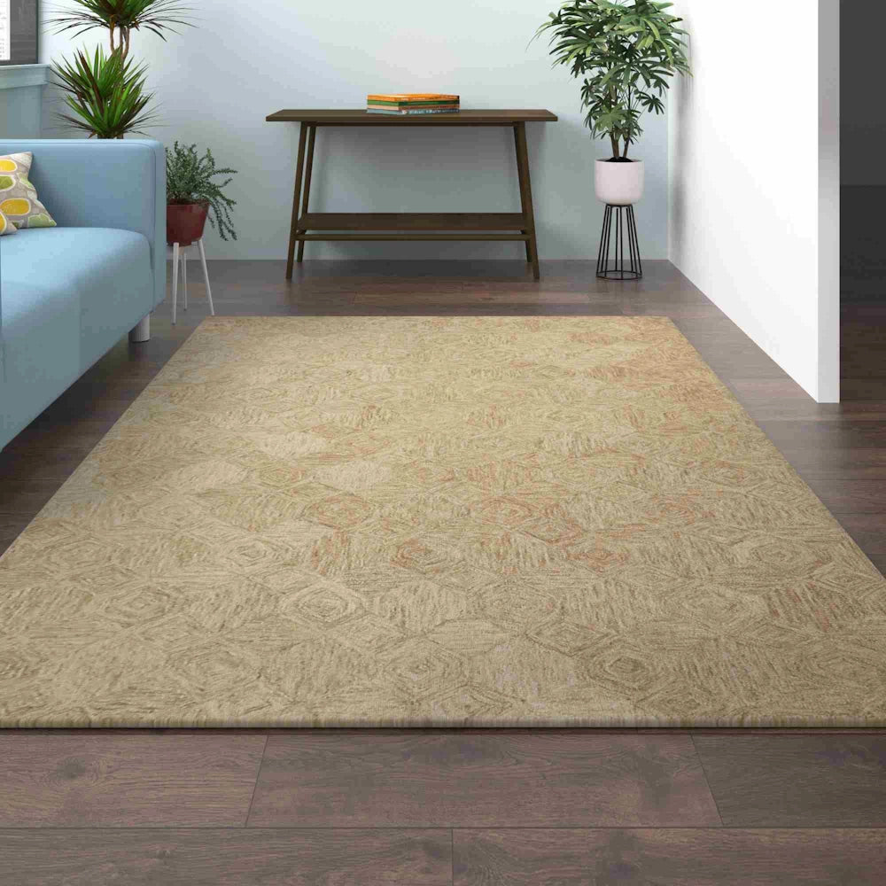 Beige hand tufted area rug in a modern living room with subtle geometric pattern and neutral contemporary style.