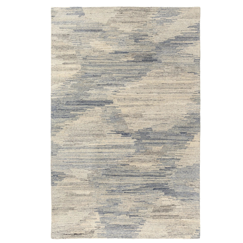 Blue and ivory hand tufted area rug with abstract striated pattern and contemporary textured design.