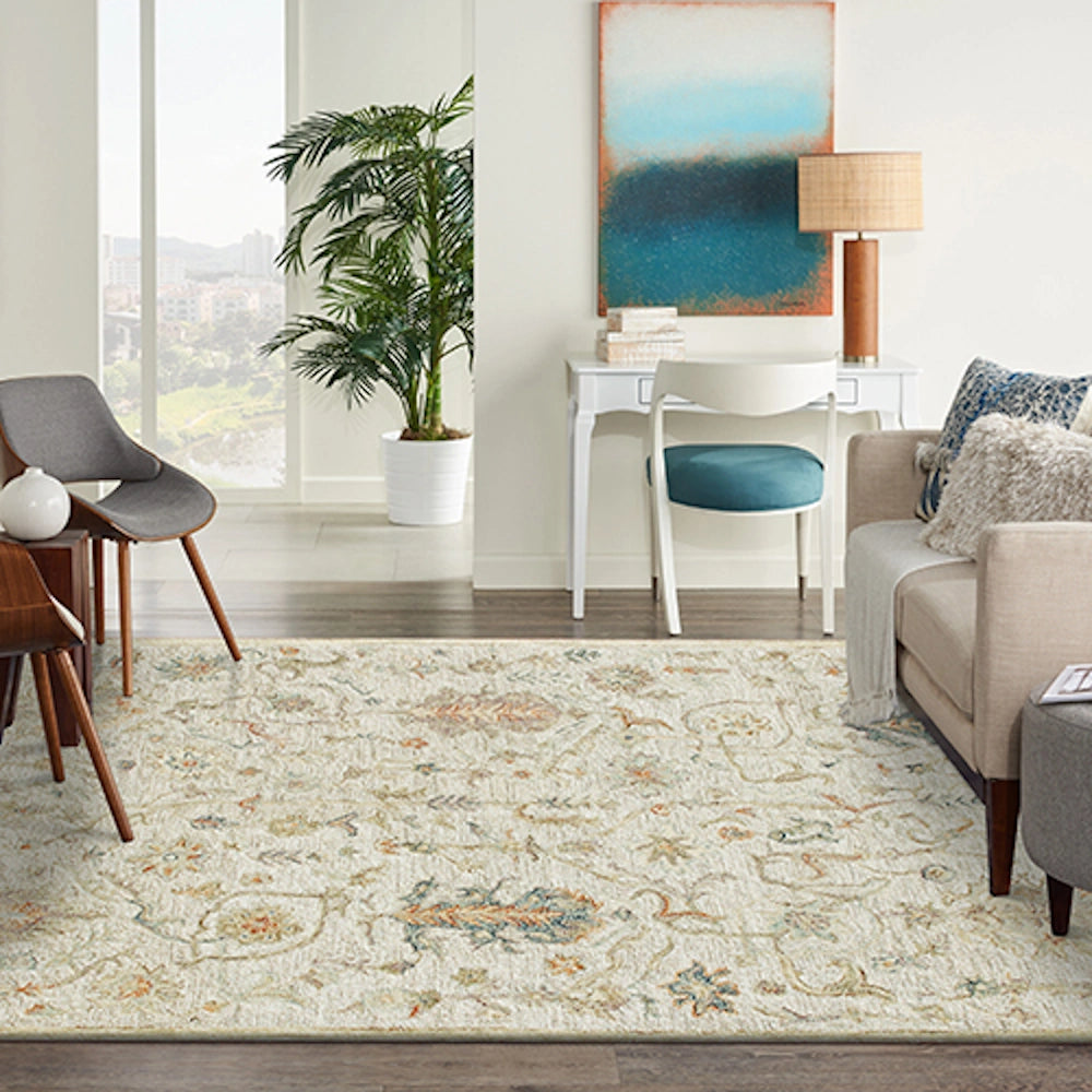 Hand-tufted rectangle vintage ivory rug in a modern living room setting.