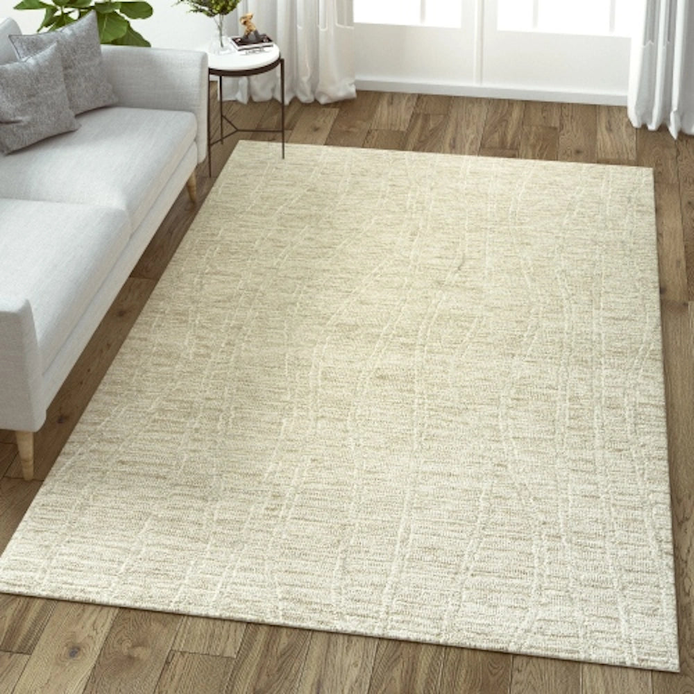 Cream hand tufted area rug with subtle grid pattern, soft textured pile and modern neutral design.