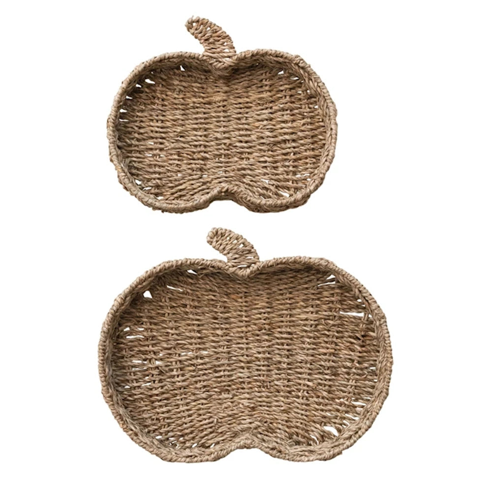 Two hand-woven seagrass pumpkin-shaped trays in small and large sizes for autumn and Thanksgiving home decor.