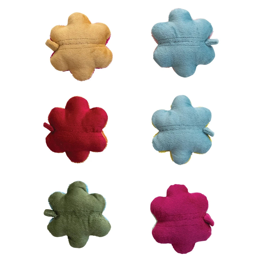 Assorted plush flower-shaped tape measures in tan, blue, red, green, and pink showing the soft fabric back side.
