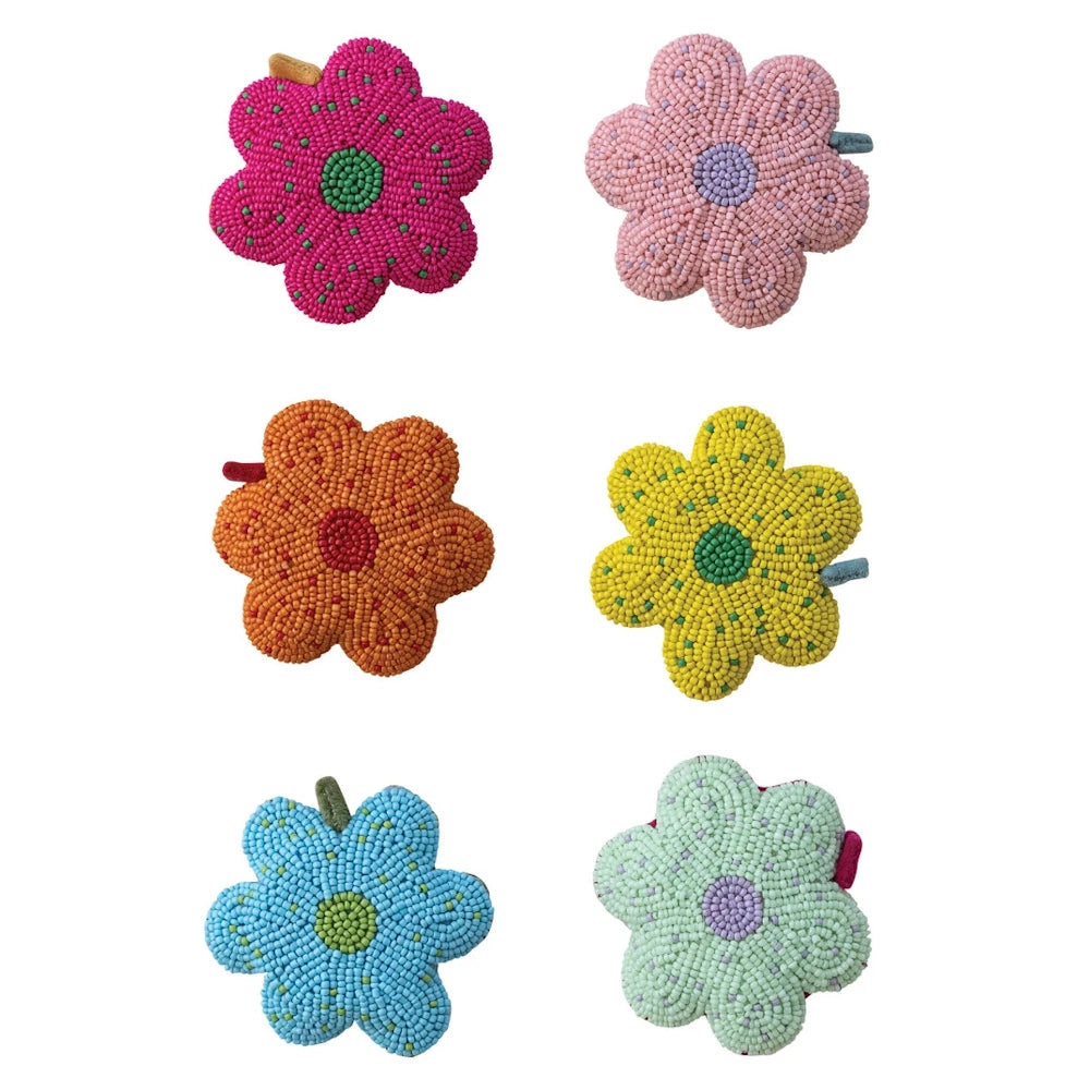 Handmade flower-shaped fabric tape measures with colorful glass bead embroidery in pink, orange, yellow, and blue.