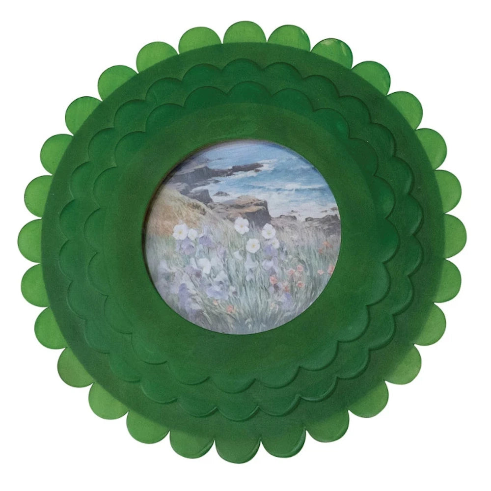 Green handmade resin photo frame with triple-layered scalloped edges and a round coastal landscape art print insert.
