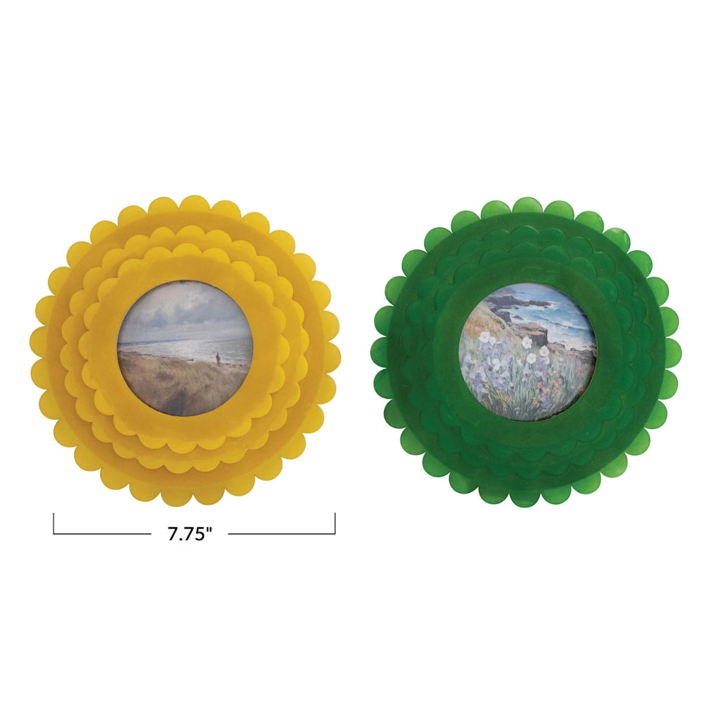 Yellow and green scalloped resin photo frames with circular centers, 7.75 inches wide, featuring landscape art.