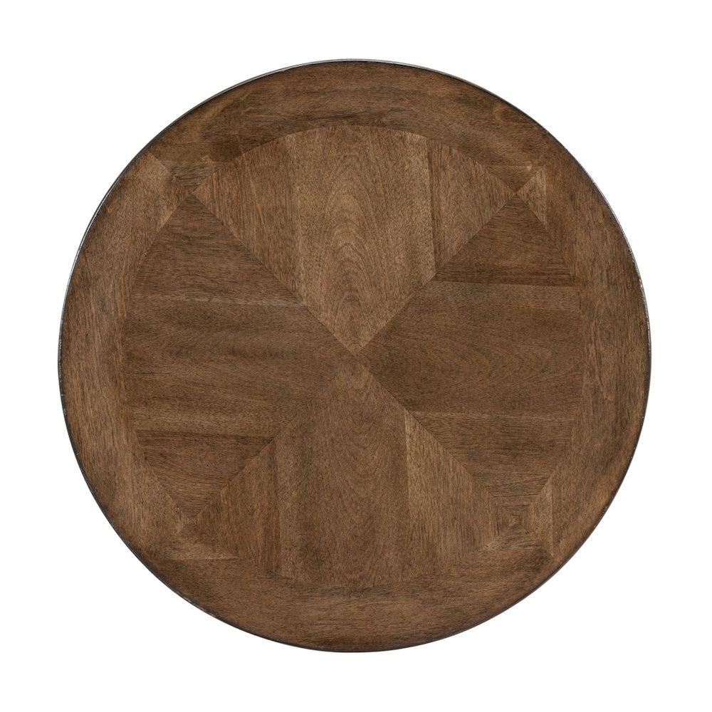 Round brown wooden side table top featuring a geometric wood veneer pattern.