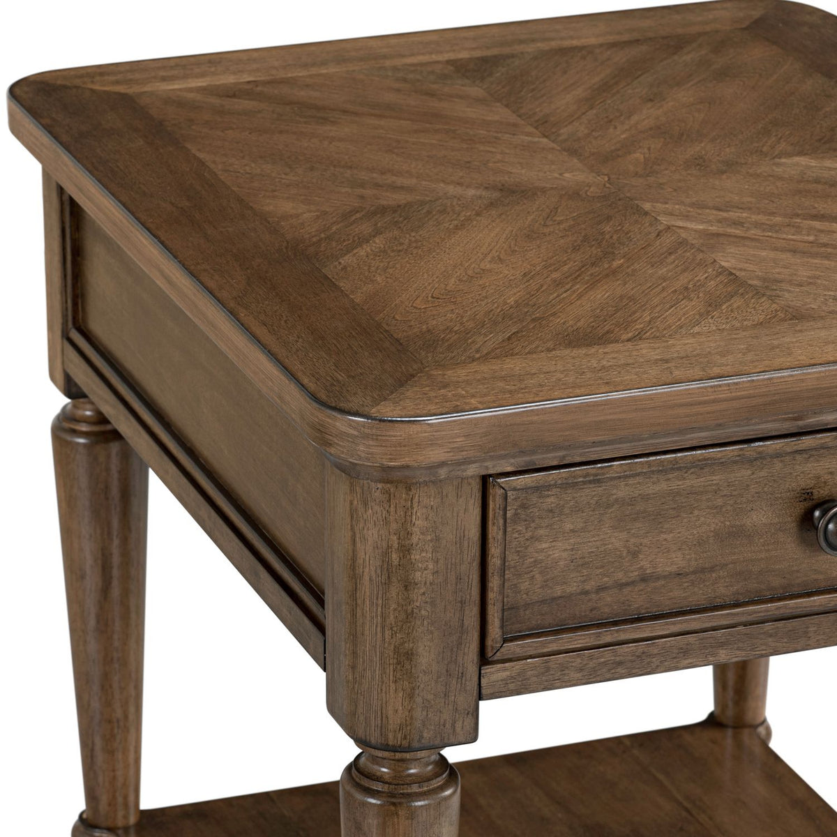 Harrison Heights wooden end table corner with a diamond pattern veneer top, single drawer, and turned legs.