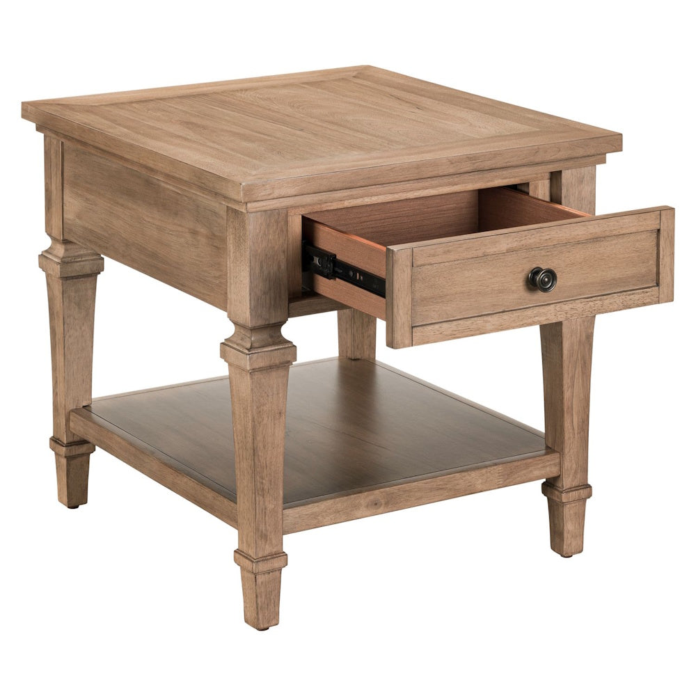 Wood end table with open drawer, lower shelf, and tapered legs in a light natural finish
