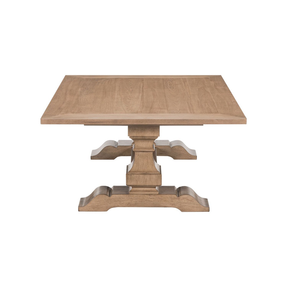 Rectangular wood cocktail table with pedestal base and natural grain finish.